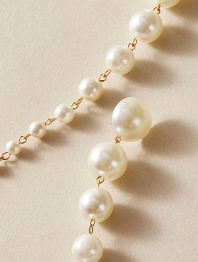 Paloma pearl long drop earrings